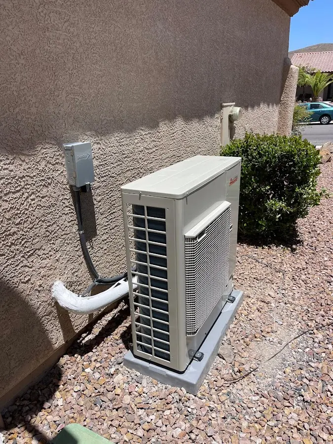 Residential air conditioning condenser unit in Clute